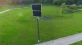 Zamontowana przy chodniku lampa solarna uliczna Perfect Max